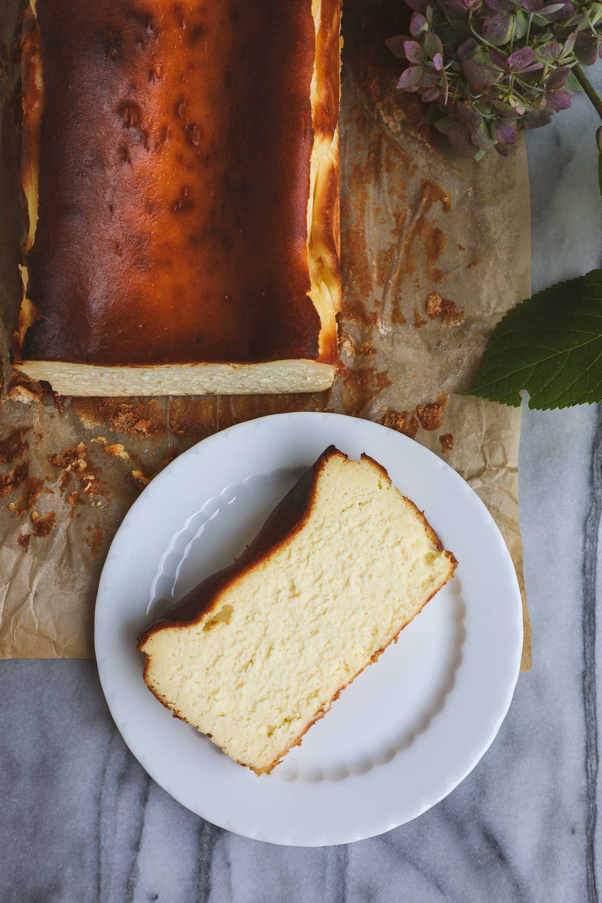 Loaf pan Basque cheesecake with a golden burnt top and creamy center