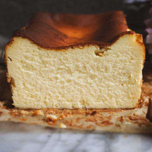 Loaf pan Basque cheesecake with a golden burnt top and creamy center